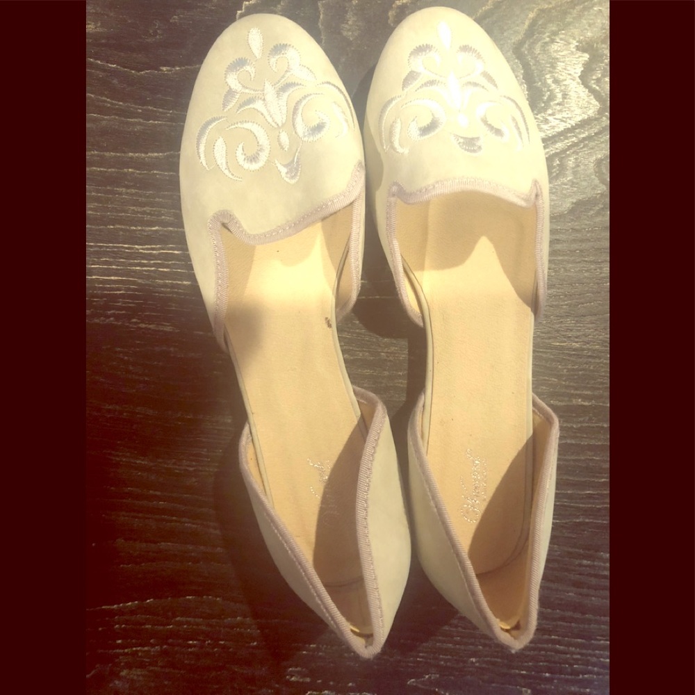 Light pale blue/green flats